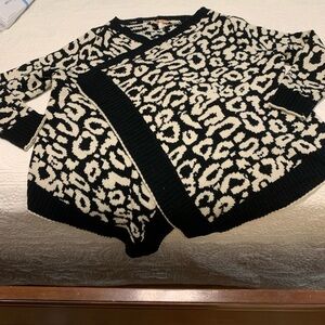 36.5 Black & White Leopard wrap around sweater. One Size fits most.